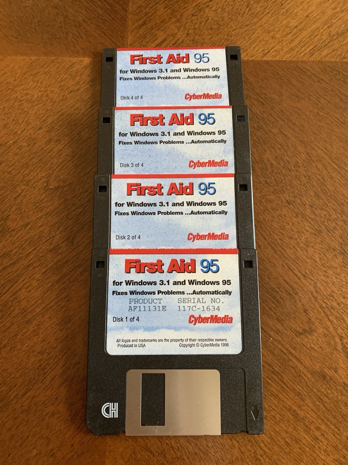 CyberMedia FIRST AID 95 For Windows 95 – 3.5″ discs, manuals, service guide