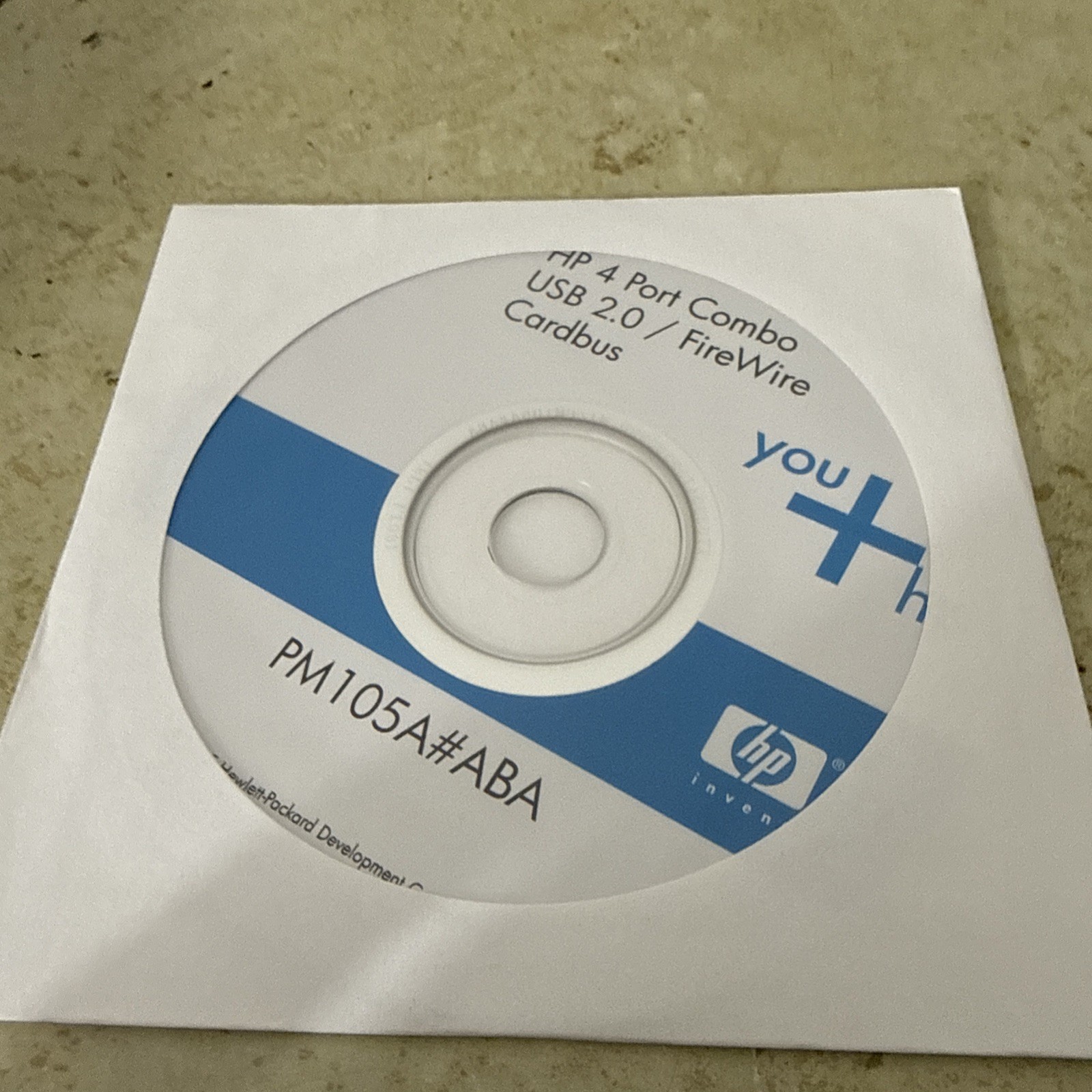 HP Color 4 Port Combo USB 2.0/ FireWire Cardbus Disk CD PM105A#ABA