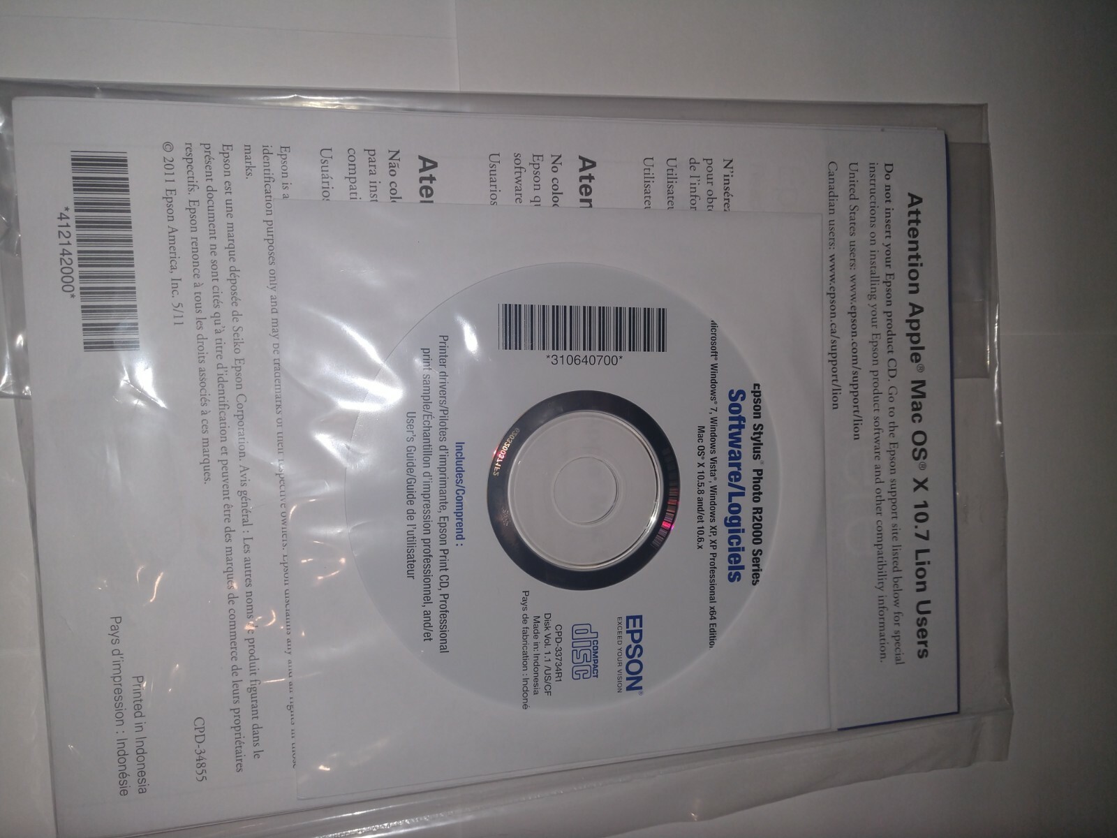 Epson R2000 Driver Installation CD and paper user manual for Windows 7