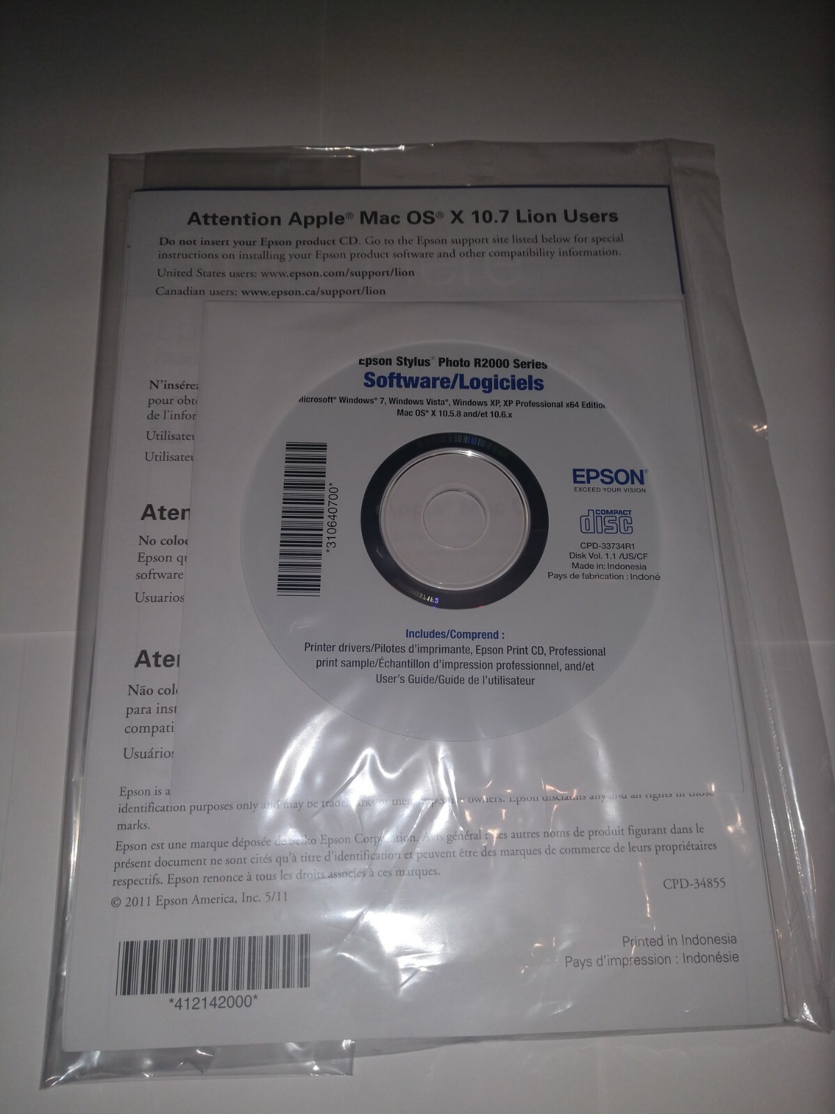 Epson R2000 Driver Installation CD and paper user manual for Windows 7