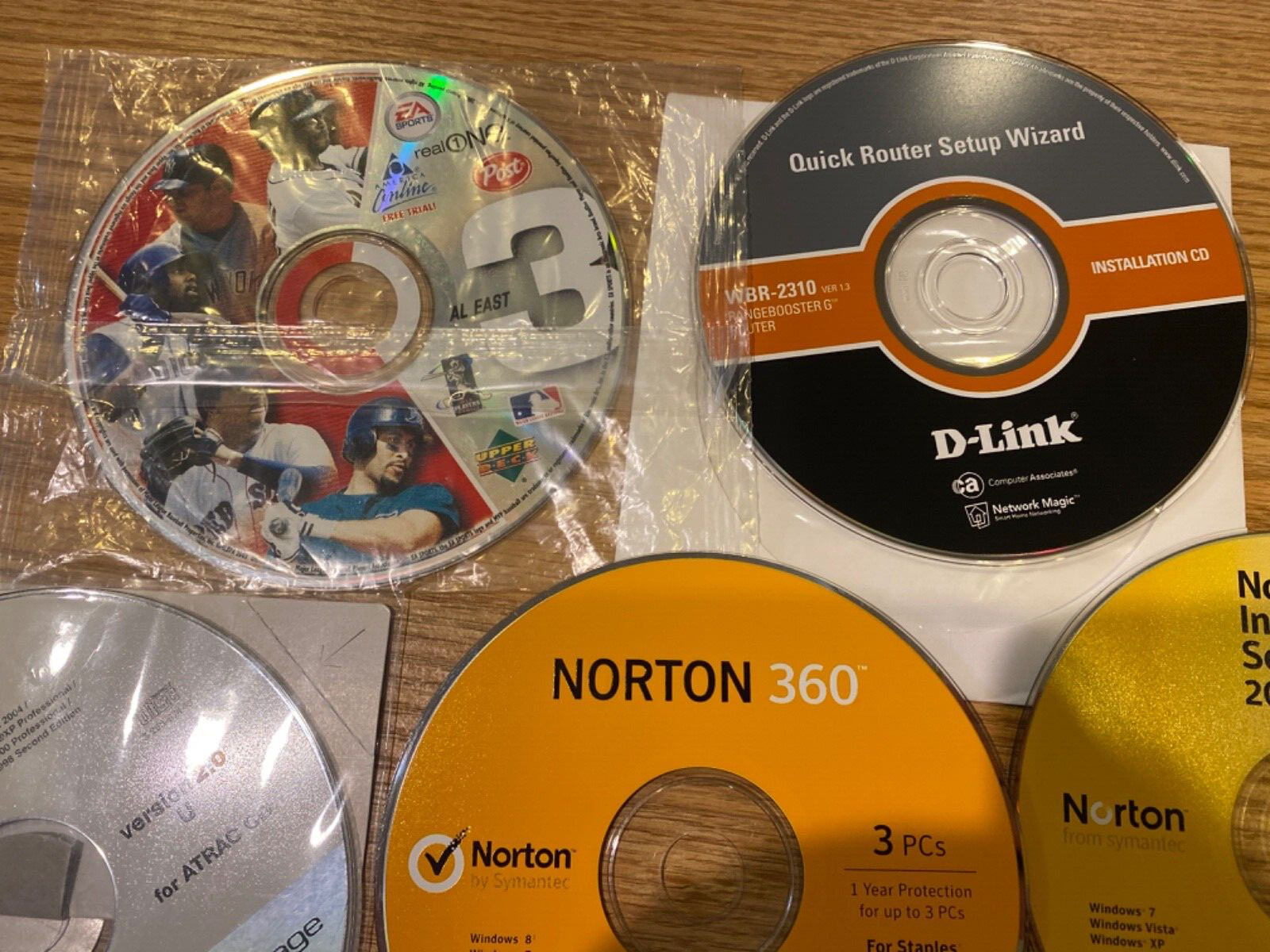 Vintage DVD CD Lot Of 7 Sony, Norton 360, Arris Touchstone, AOL Upper Deck Post