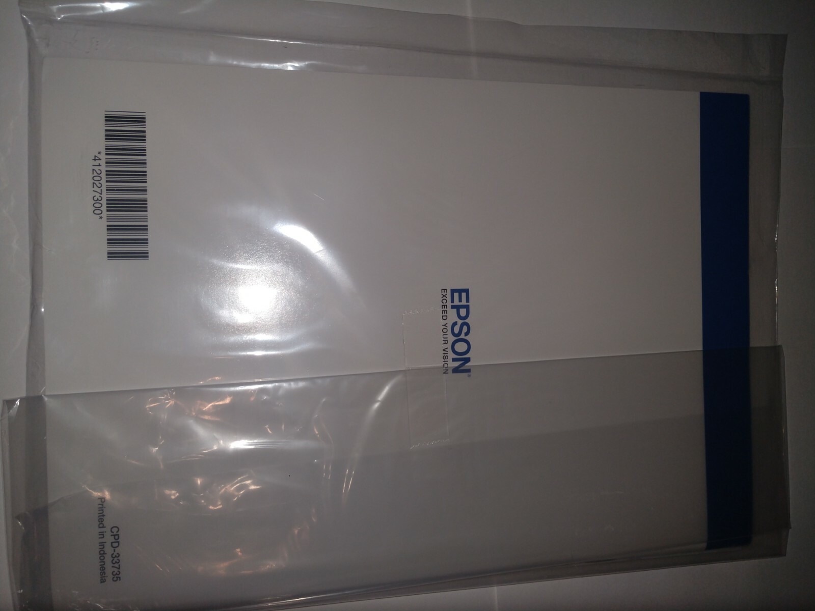 Epson R2000 Driver Installation CD and paper user manual for Windows 7